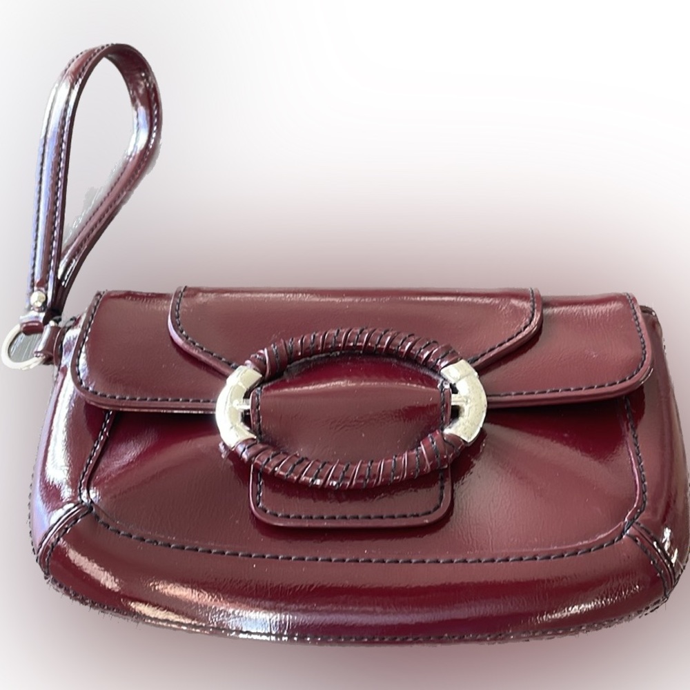 Ann Taylor Small Shiny Burgundy/Reddish  Wristlet .